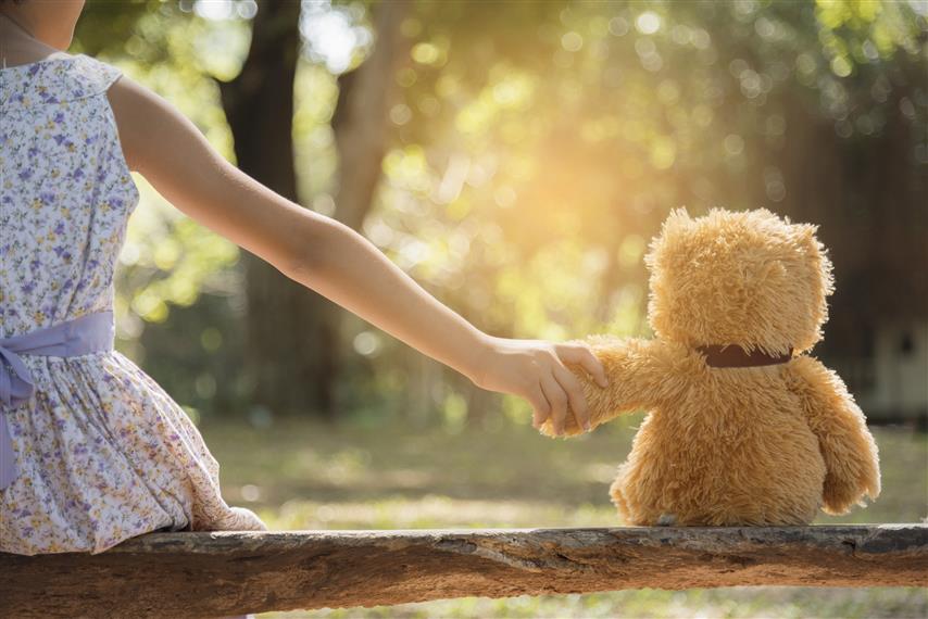 A teddy bear is a best friend for any little girl.